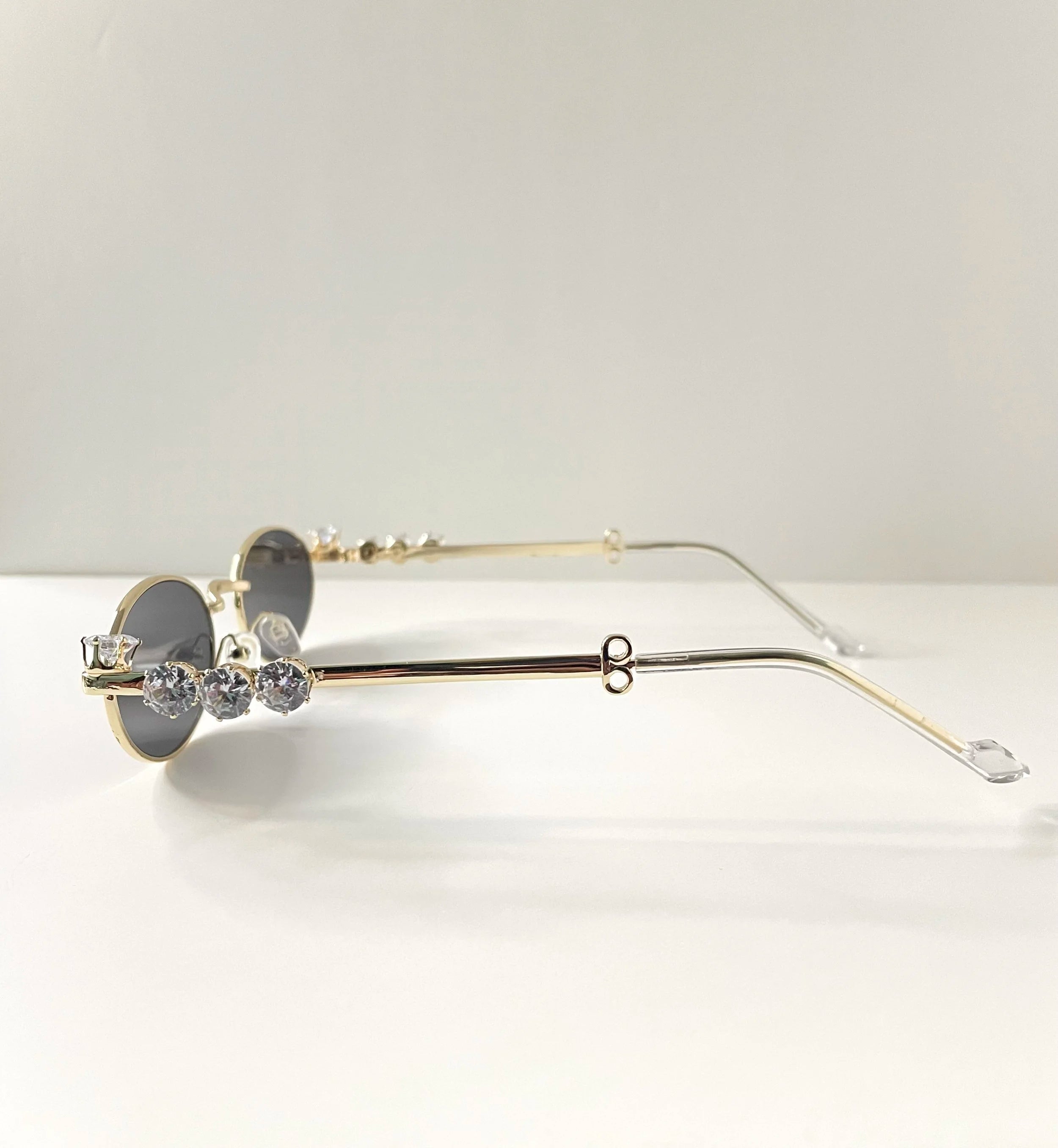 Kagiso Gold Embellished Oval Sunglasses