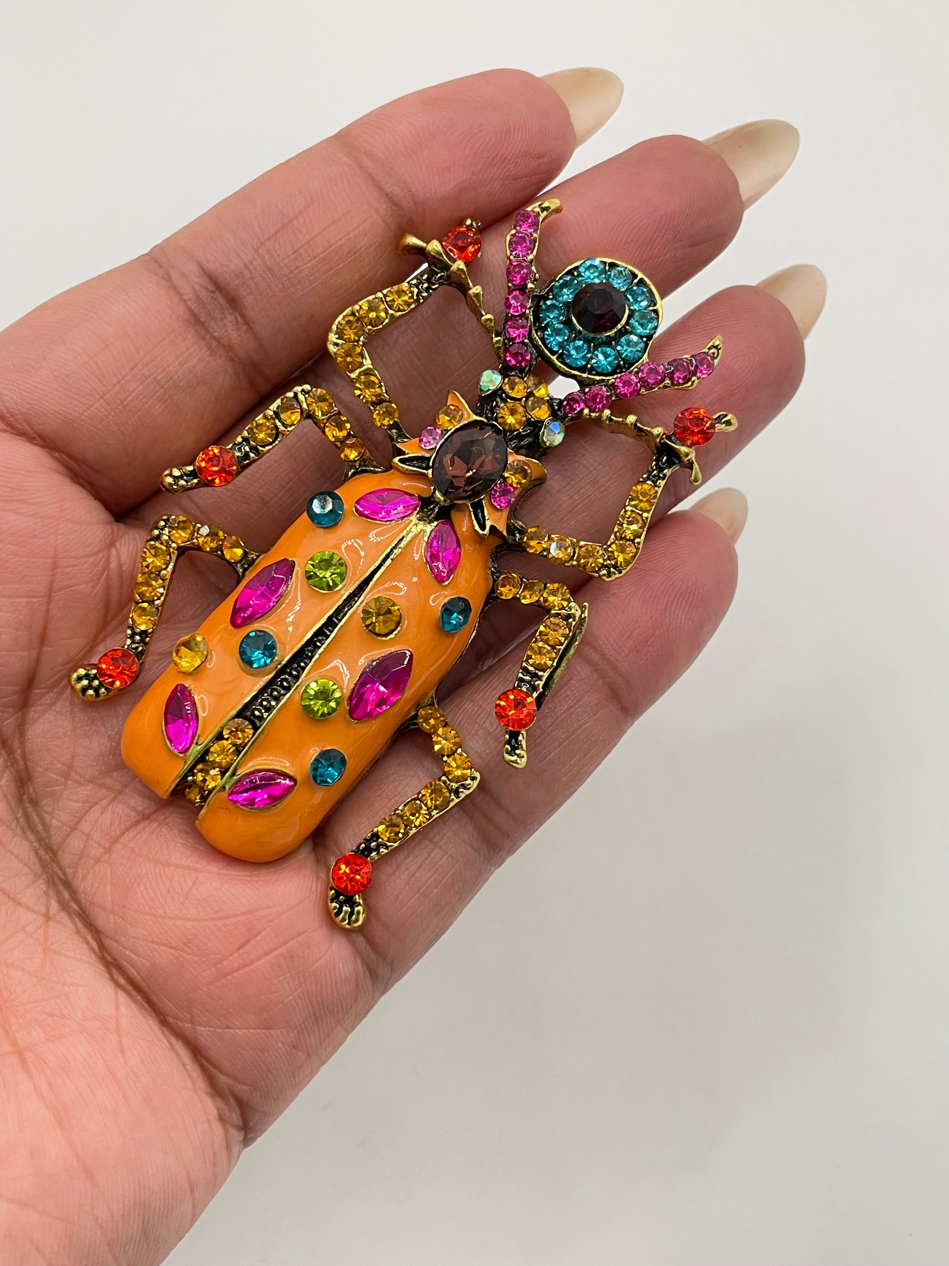 Michelle Orange Embellished Beetle Brooch