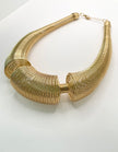 Khumbu Gold Textured Spiral Statement Necklace