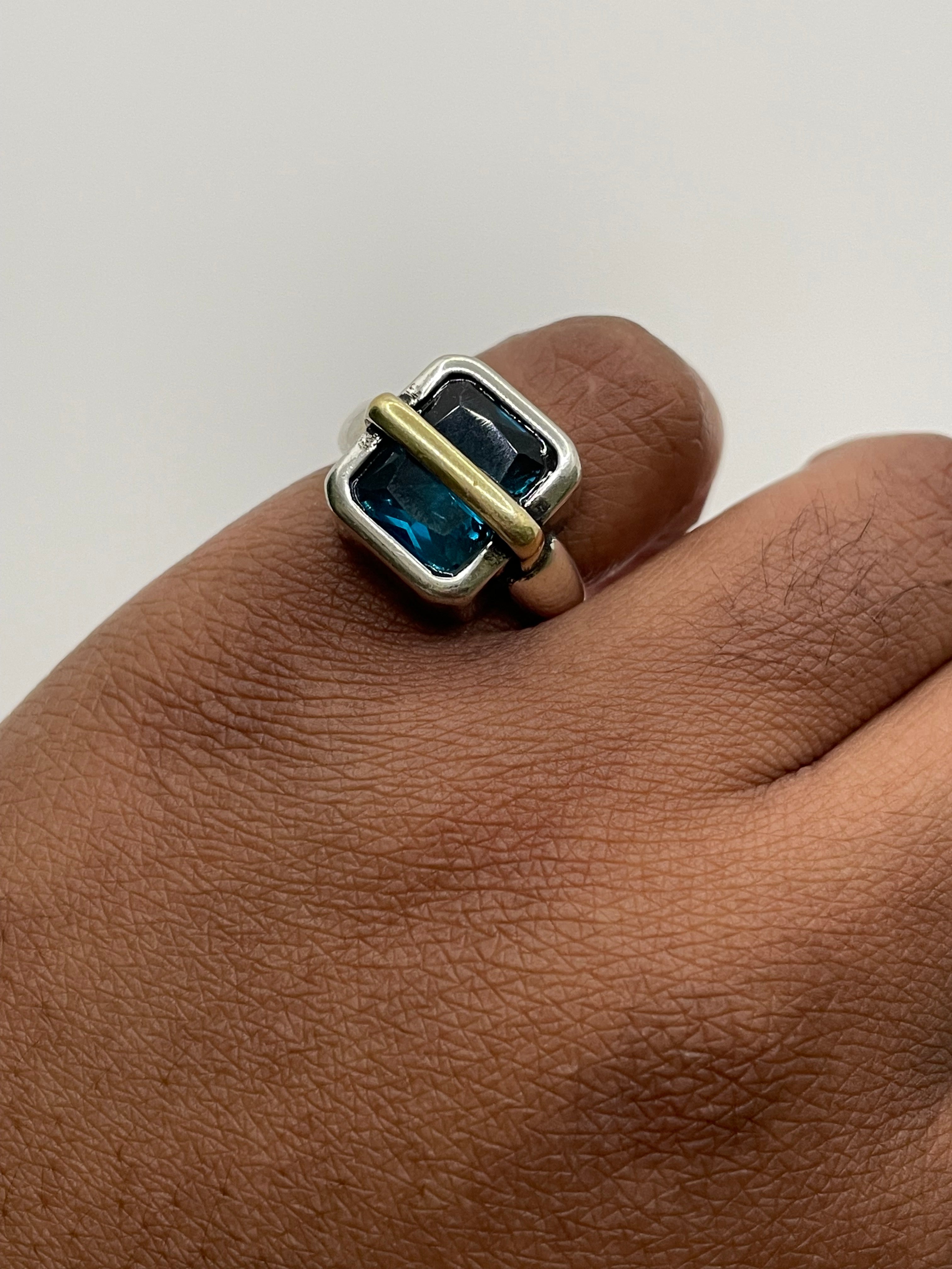 Nesisa Mixed Metal Ring With Blue Gem